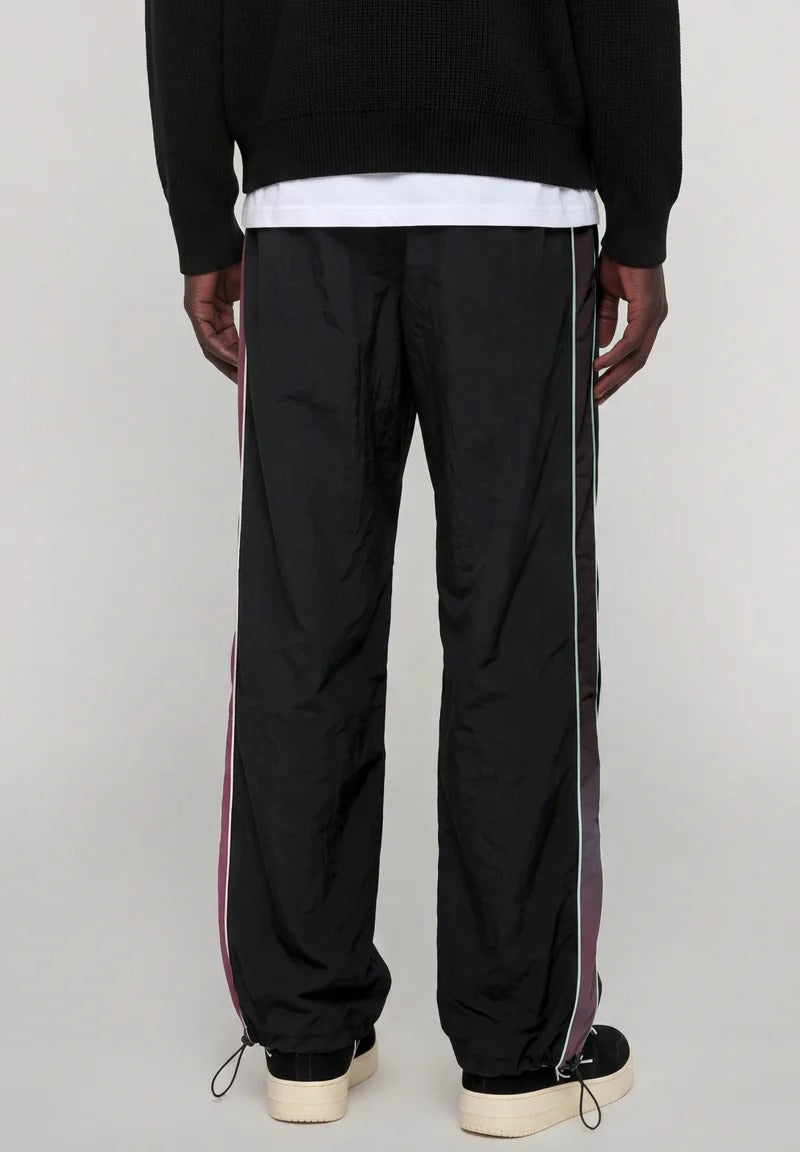 Karl Kani Signature Sidestripe Baggy Trackpants black/berry dettaglio
